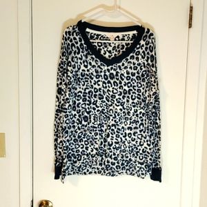 Leopard print blue long sleeve sweater.